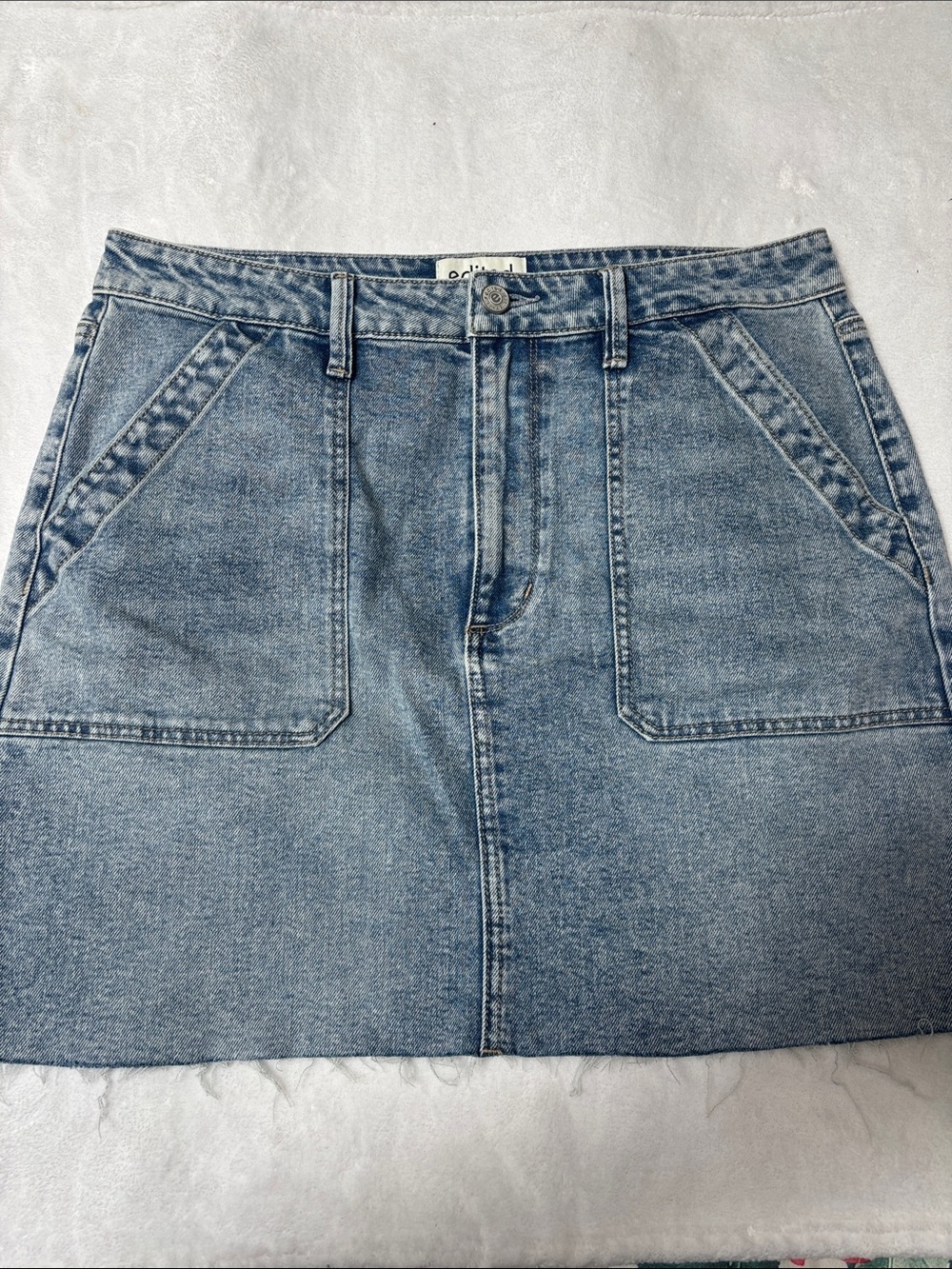 Light Wash Denim Mini Skirt with Front Patch Pockets